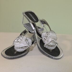 Chic White Sandals with Floral Detail